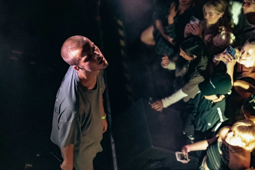brakence performing live, looking up over the crowd